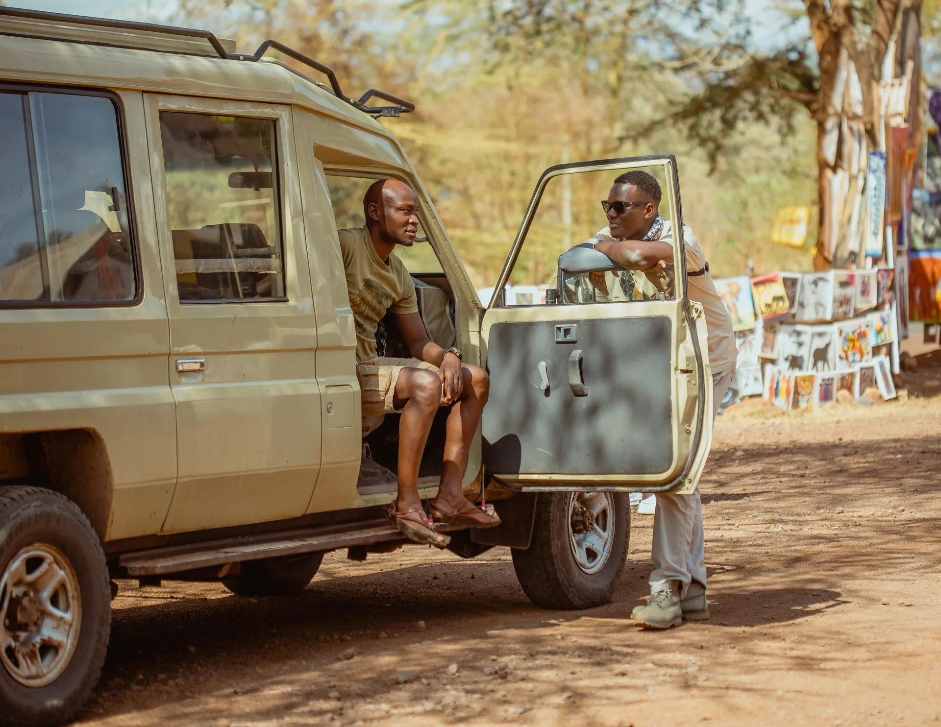 Safari vehicle travelling through a Tanzania wildlife area
